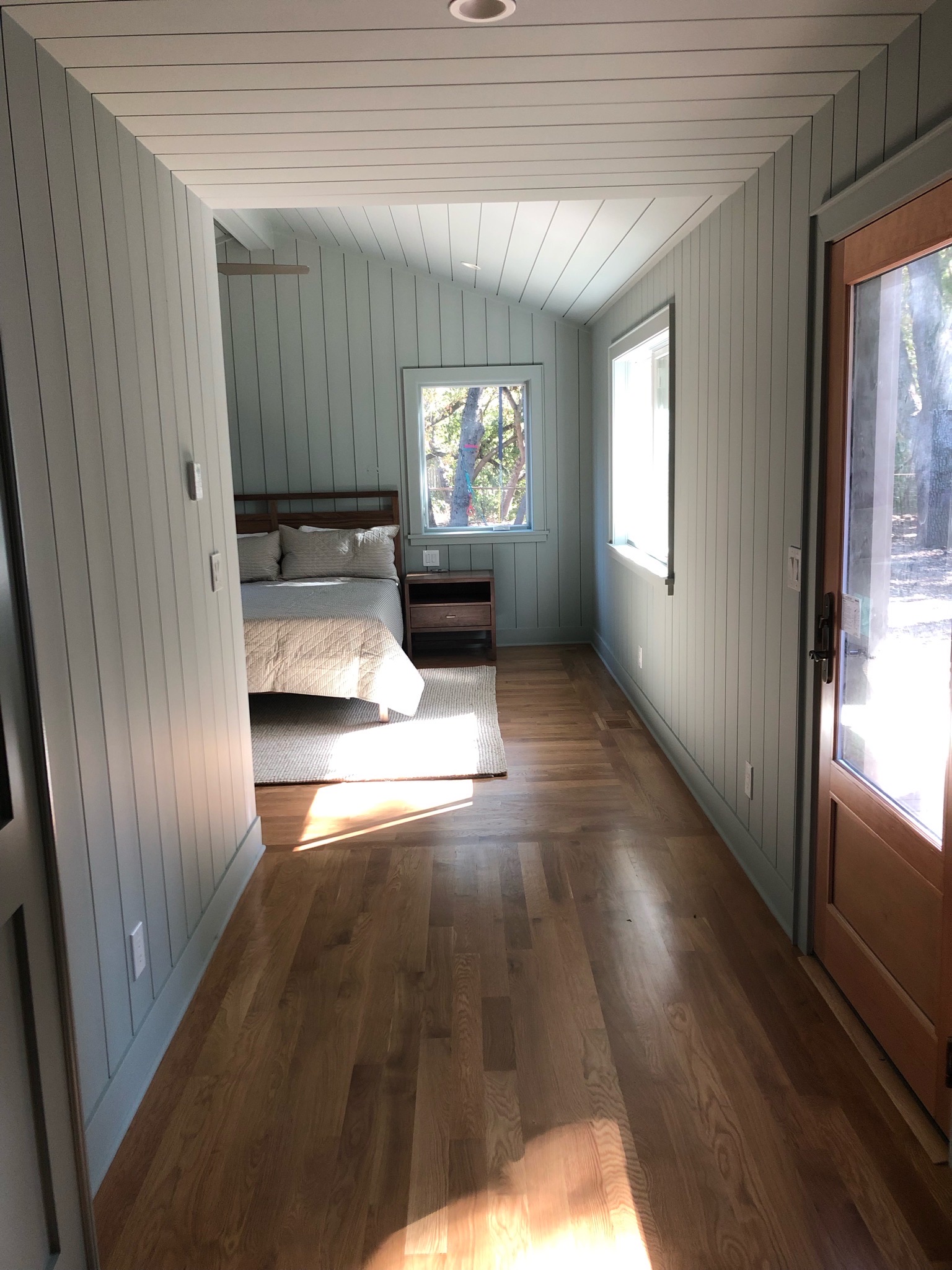 Master bedroom with vaulted ceiling and sitting area