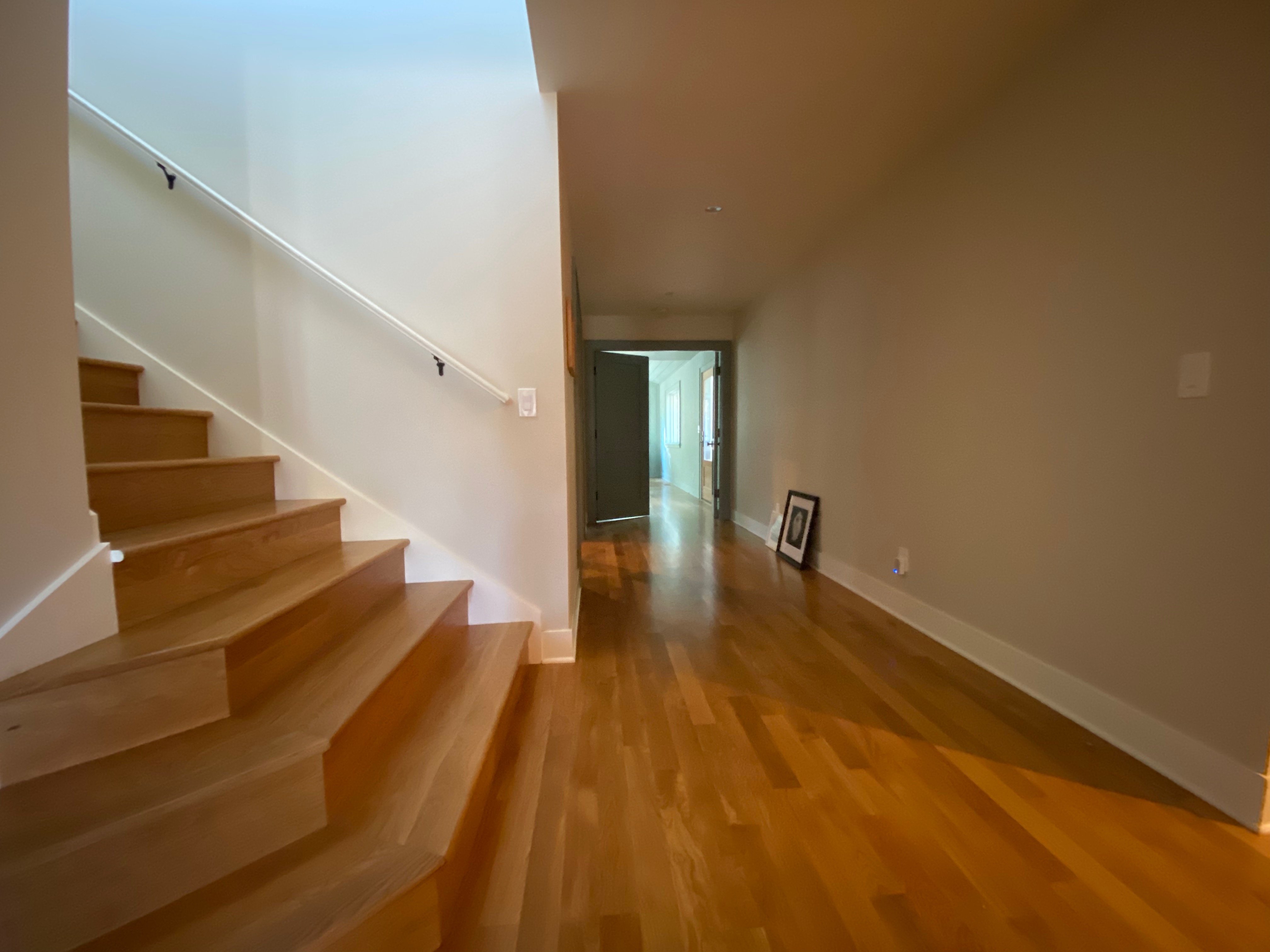 Wide hallway in master suite addition