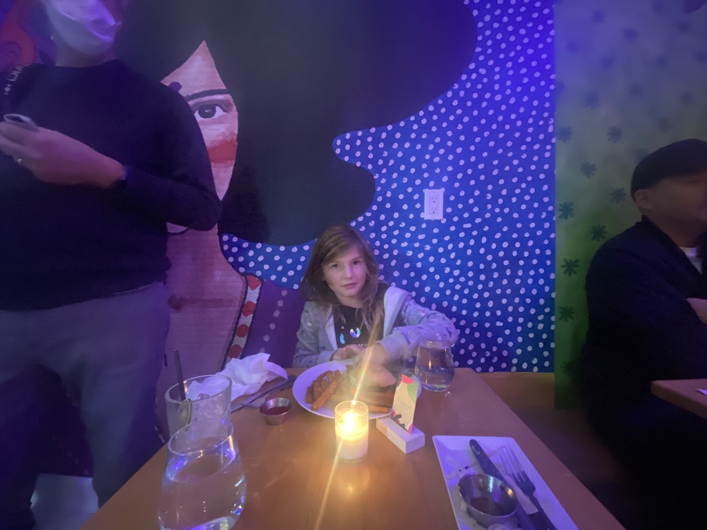 Lily at vegan burger restaurant